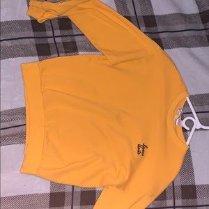 yellow sweatshirt